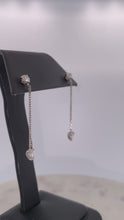 Load and play video in Gallery viewer, Dangle Pear Diamond Earrings
